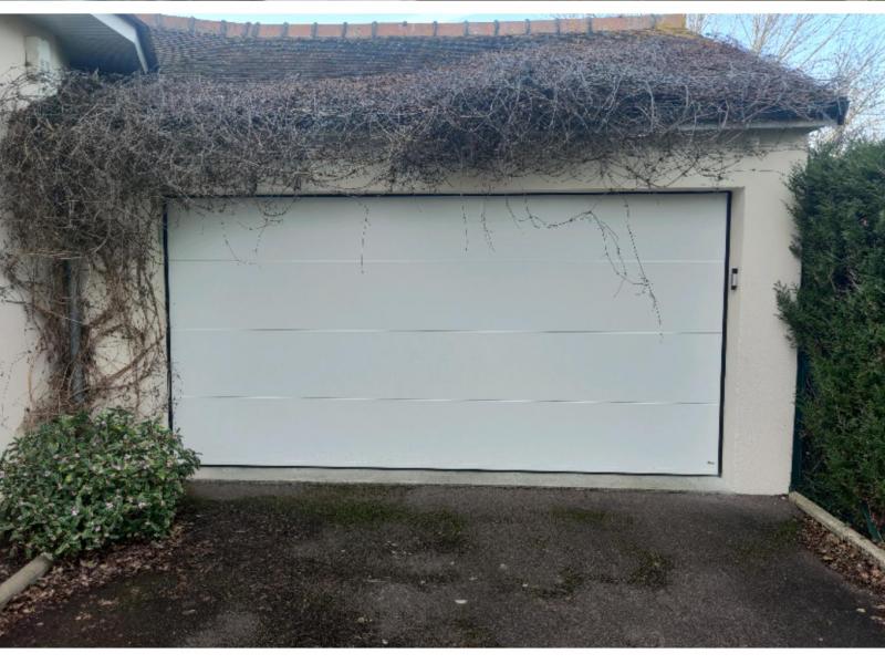Remplacement d'une porte de garage à Ranville