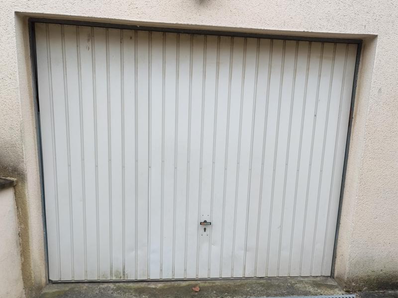 Remplacement d'une porte de garage par l'entreprise Varignon - Photo avant changement